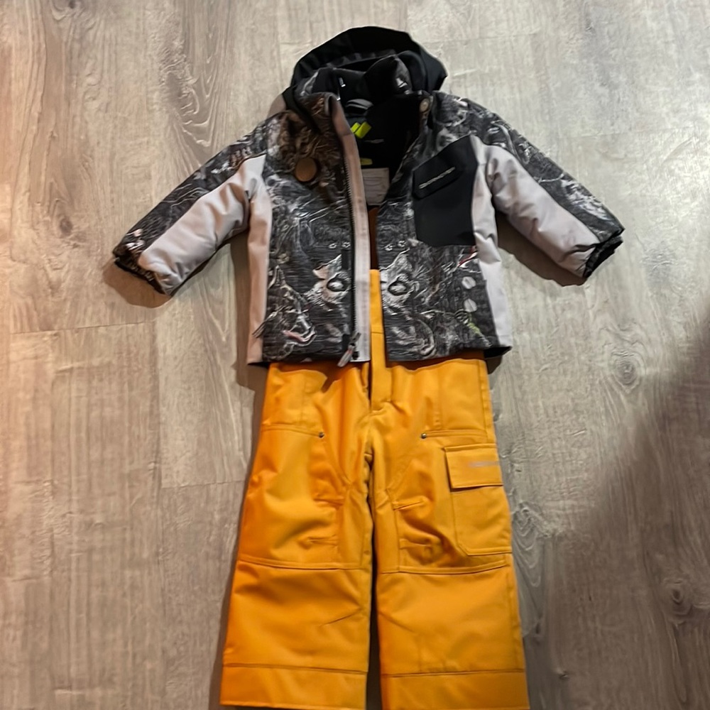 This is obermeyer children’s size 2 stretch and grow snow gear bibs and jacket.
